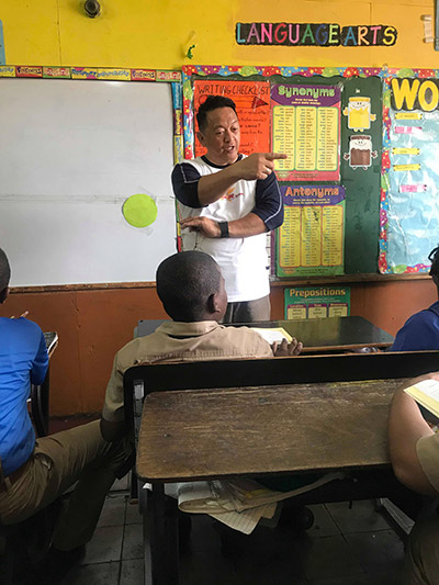 Fr. Emilio Reyes, SVD, shares his story with schoolchildren in Kingston, Jamaica