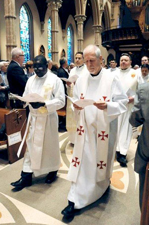 Fr. Sam Cunningham, SVD participates in a Catholic ceremony