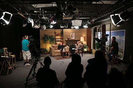 Long shot of tv studio while taping