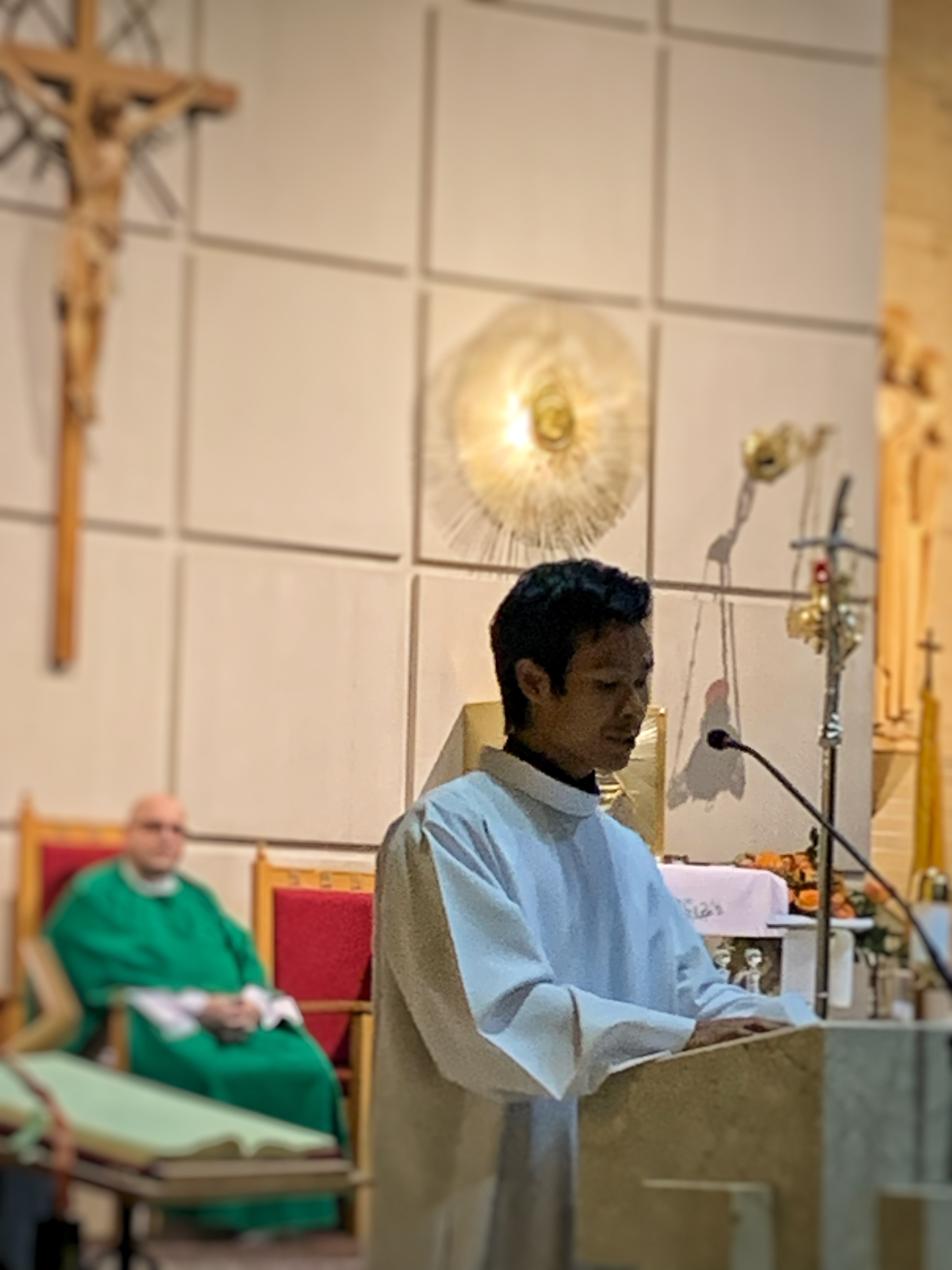 Frt. Boromeo Seo reads at the ambo during Catholic mass