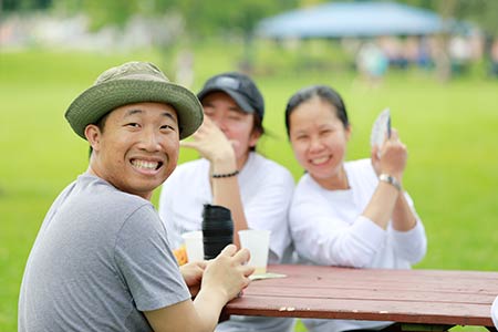 Hoang Do shares a laugh with fellow students