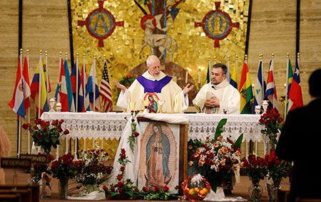 Fr. Sam Cunningham presiding at the altar during the feast of Our Lady of Guadelupe