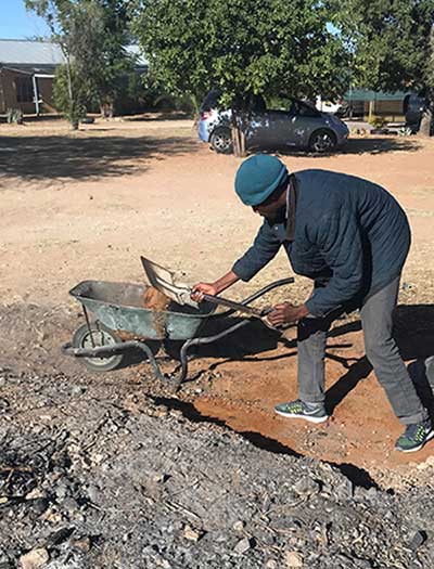Botswana youth helps build activity area